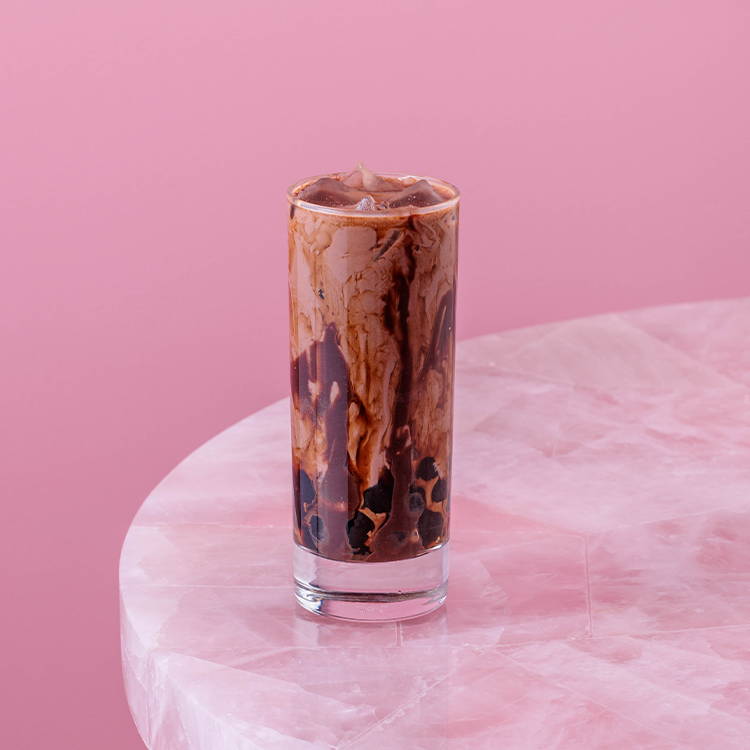 Nutella bubble tea on pink background 