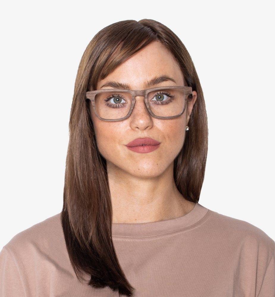 Woman wearing Bold Brown, Rectangle 90s Glasses in Oak Wood