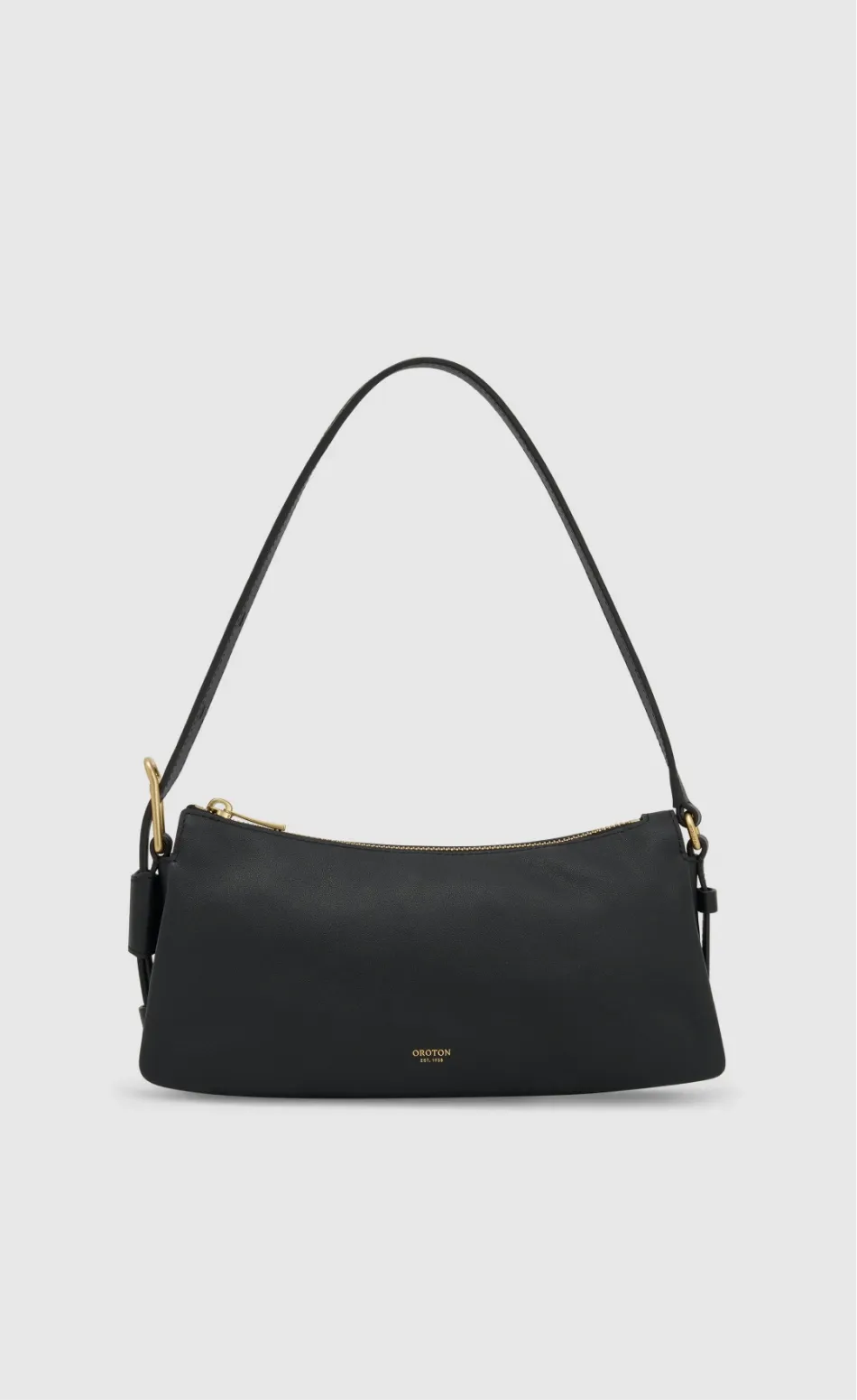 Black leather handbag with a curved shoulder strap and gold hardware.