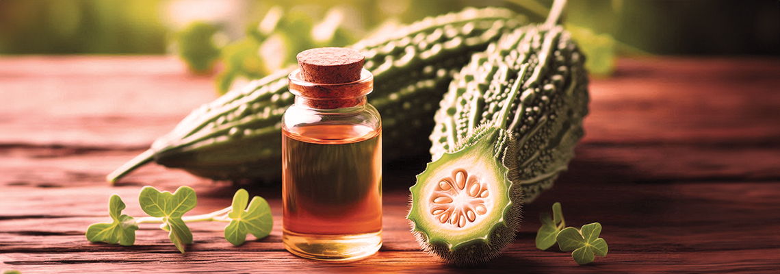 Bitter gourd and oil on a wooden surface with green background.