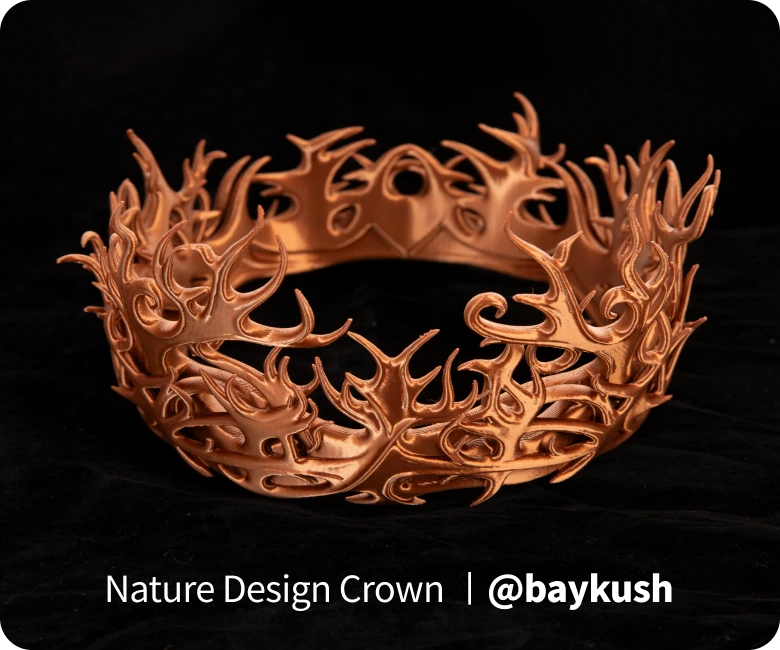 A crown designed with nature-inspired motifs in a bronze color.