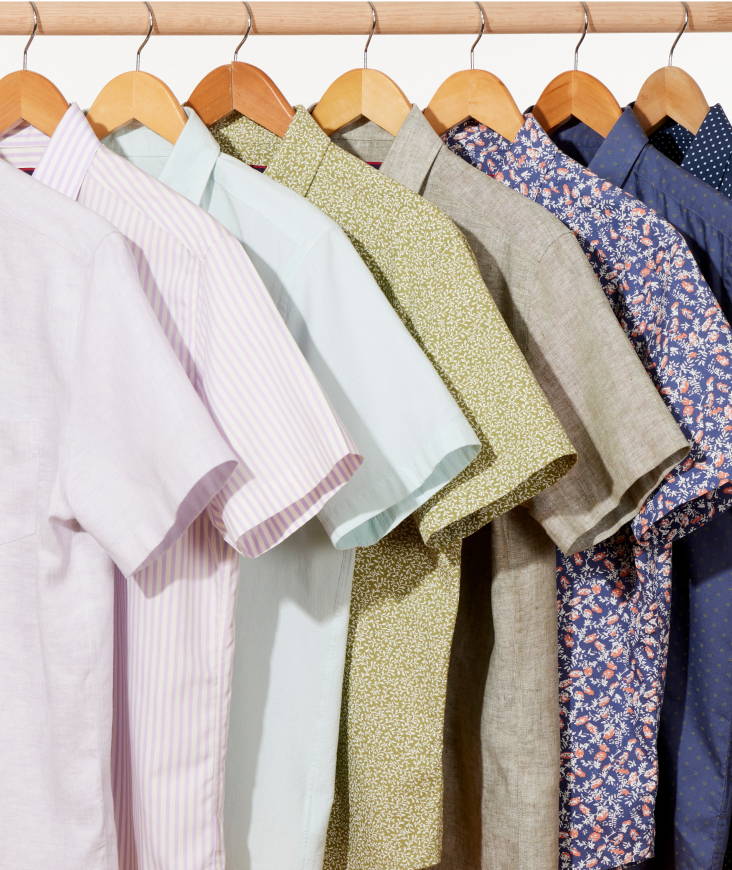 Collection of UNtUCKit sort sleeve shirts in various colors. 