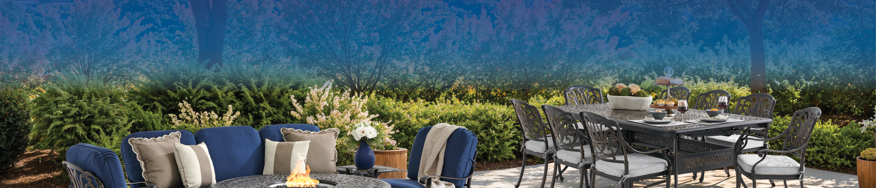 Outdoor furniture setup by a pool, featuring seating and dining arrangements.