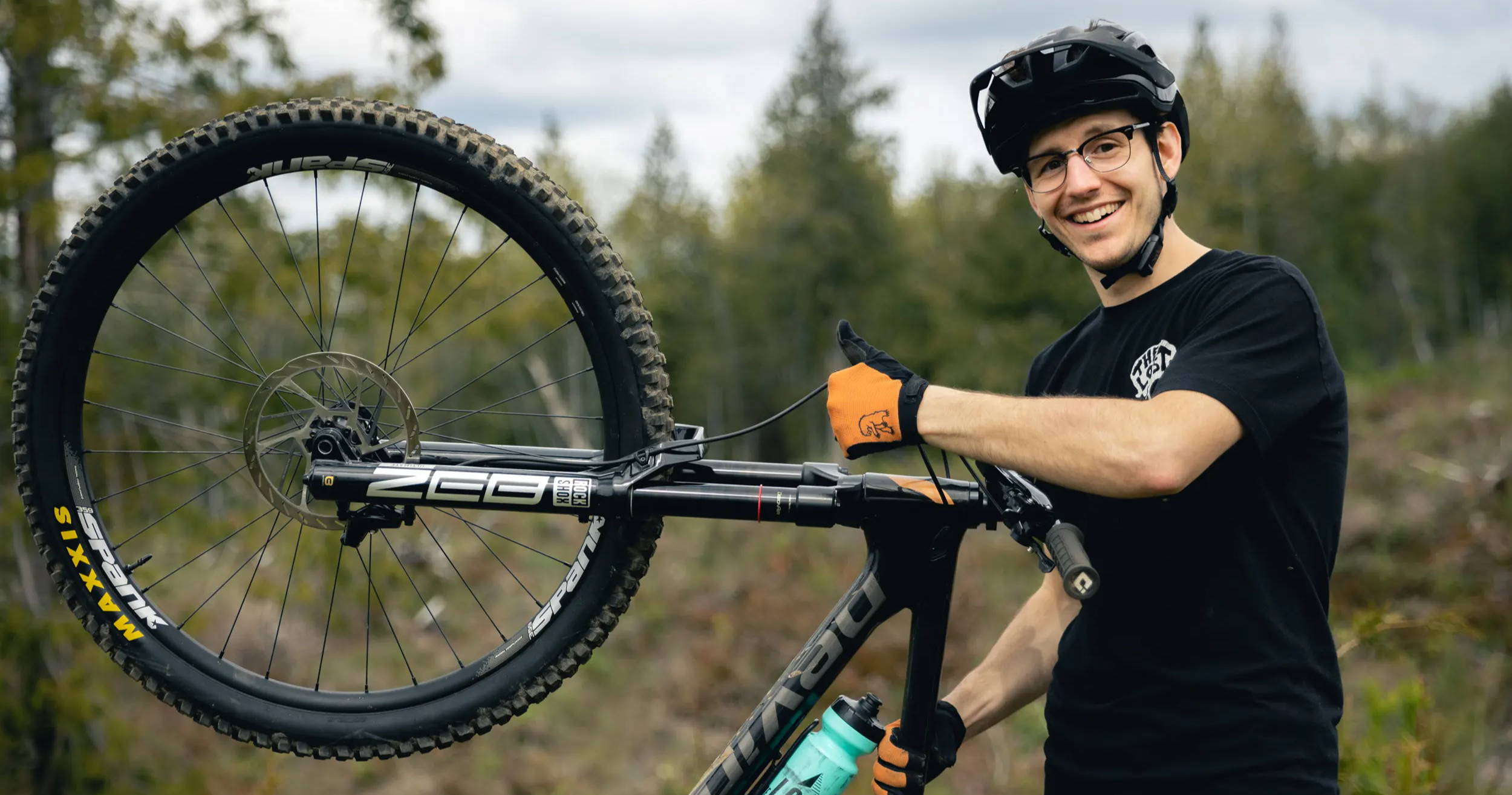 mountain biker with thumbs up for rockshox zeb ultimate fork