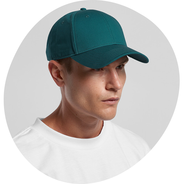 Model wearing a teal structured baseball cap