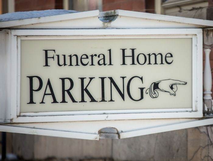 Funeral home parking sign