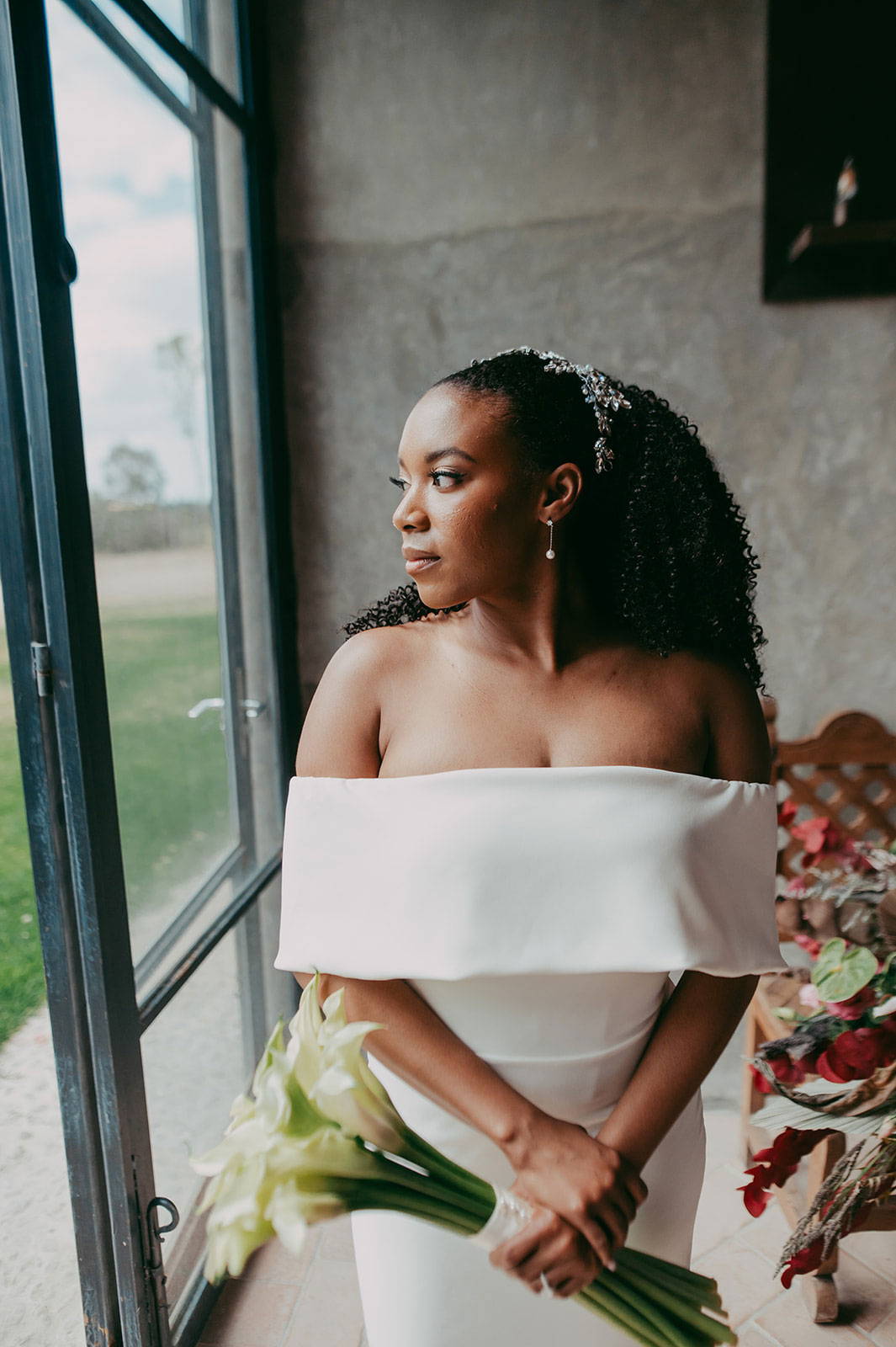 Bride looking out the window