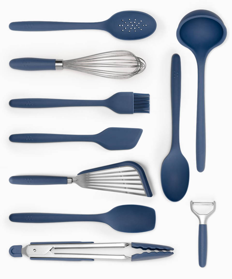 A Blue Misen 10-Piece Prep Tool set—including Slotted Spoon, Whisk, Pastry Brush, Mixing Spatula, Fish Spatula, Spoontula, Tongs, Mixing Spoon, Ladle, Peeler, and Prep Tool Holder. 