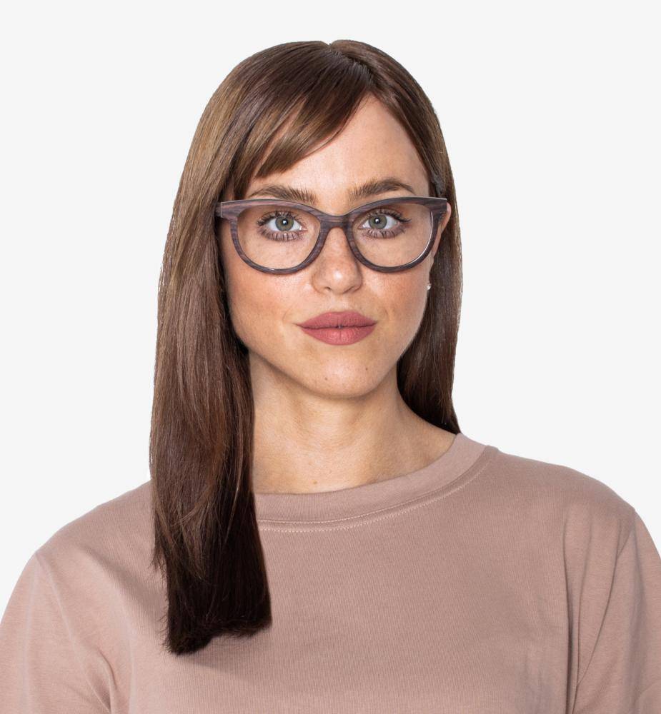 Woman wearing Charm Purple, Cat-Eye Thick Frame glasses made from Sandal Wood