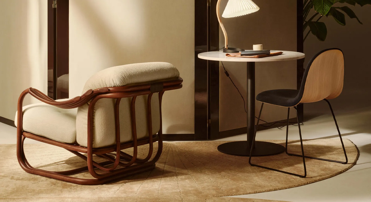 Stylish Gubi chair and table set in a cozy interior space.