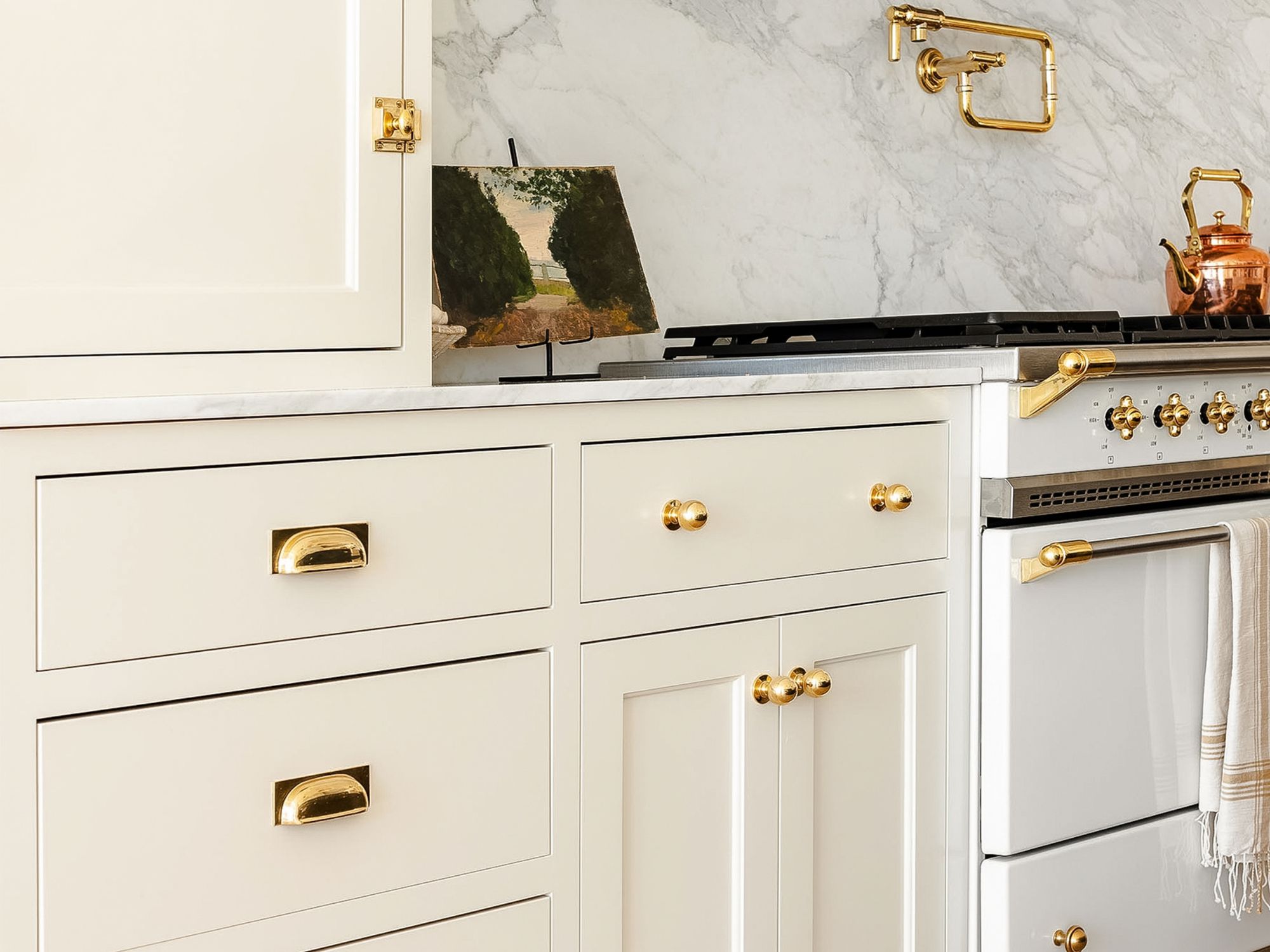 studio mcgee neutral kitchen with brass hardware