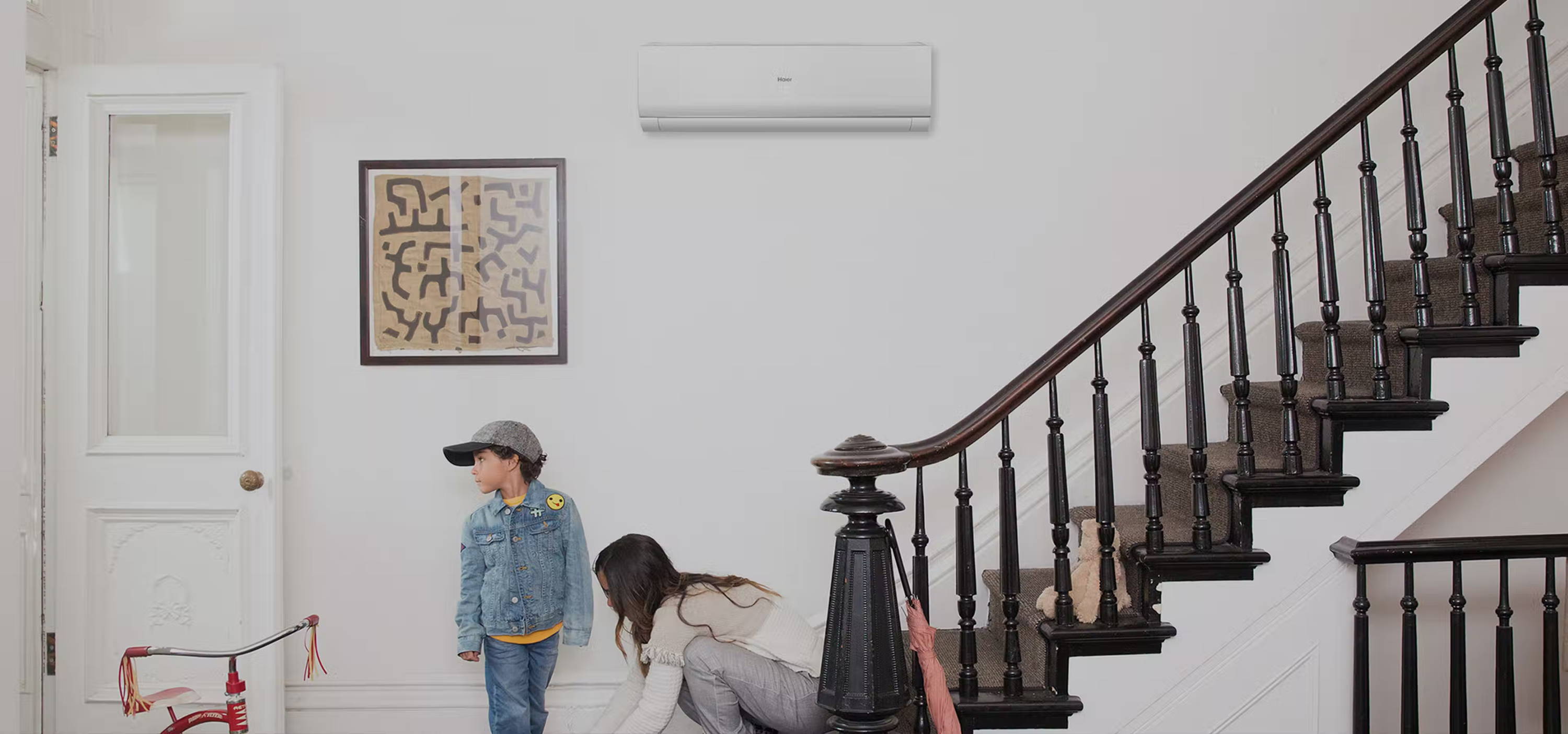 Photo of a Haier ductless wall mount mini split air conditioner installed in foyer of home