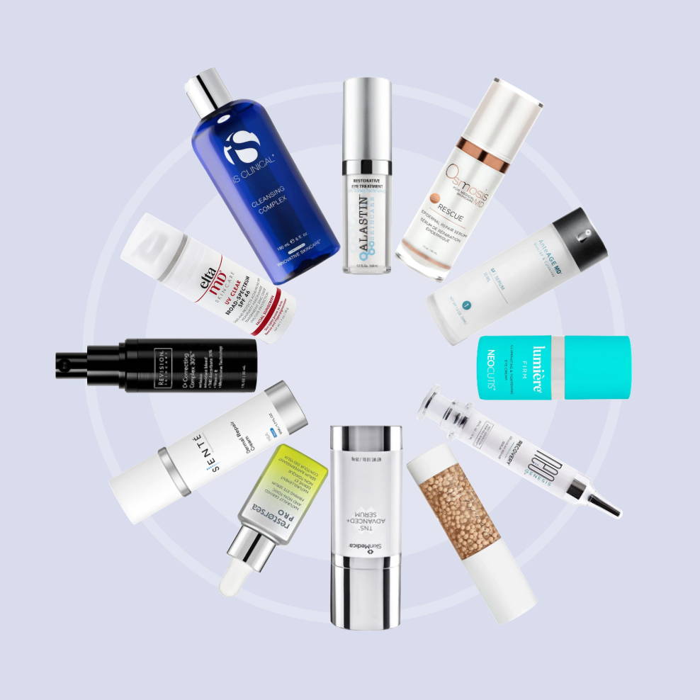 12 skincare products arranged in a circle like the spokes of a bicycle wheel, against a periwinkle background.