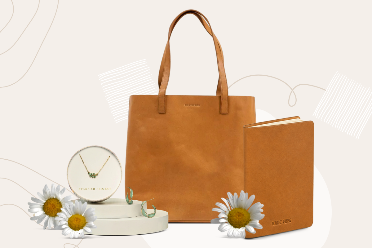 Brown tote bag, notebook, jewelry box, and daisies on a light background.