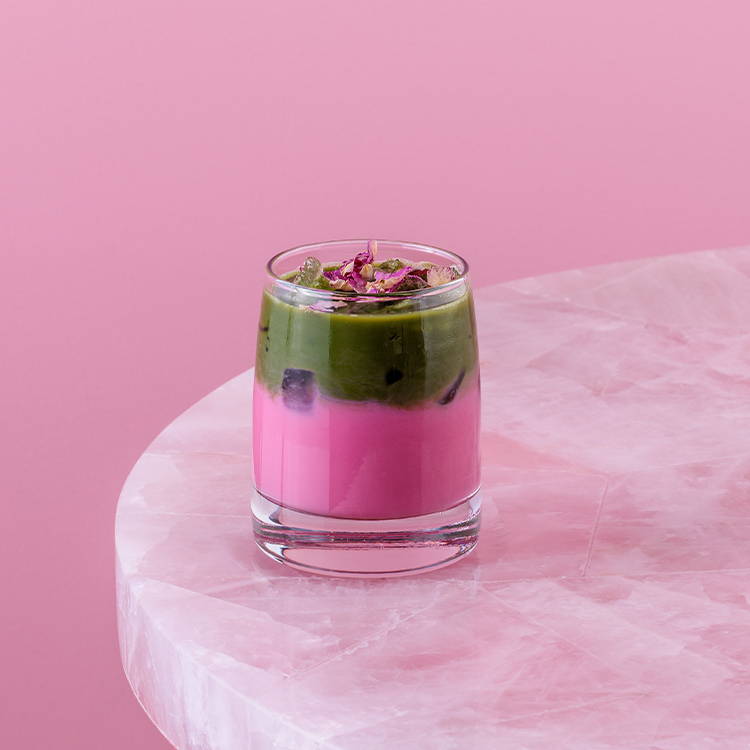 Matcha Rose Iced Latte, pink and green drink with rose petals