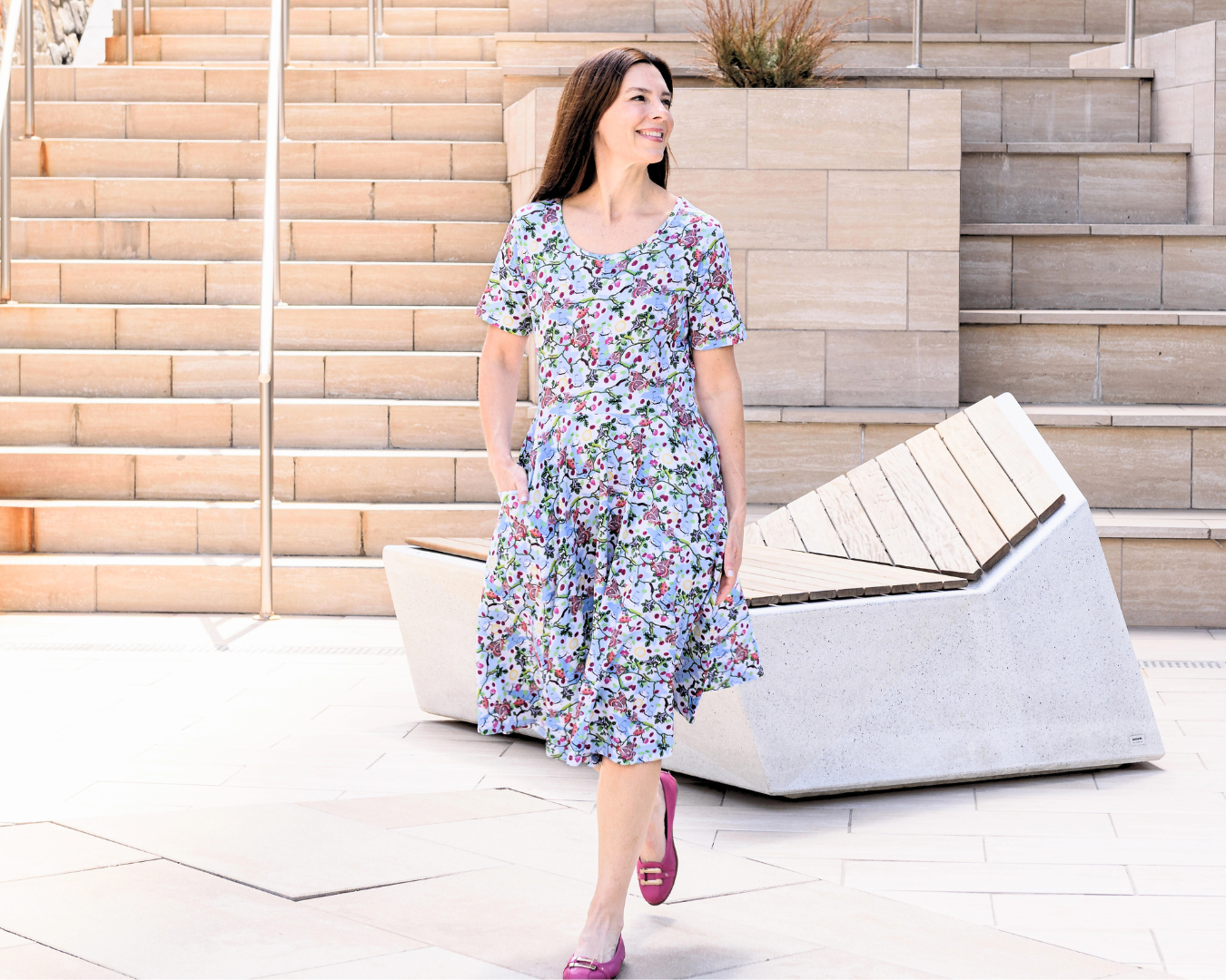 Woman wearing Trophic Levels Dress styled for classroom teaching