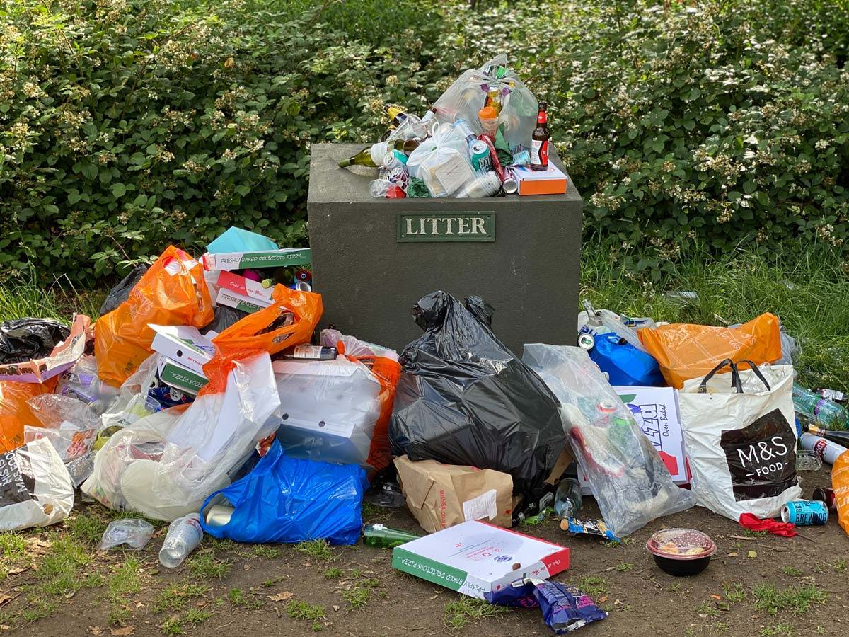 Garbage bags surrounding a Garbage Can