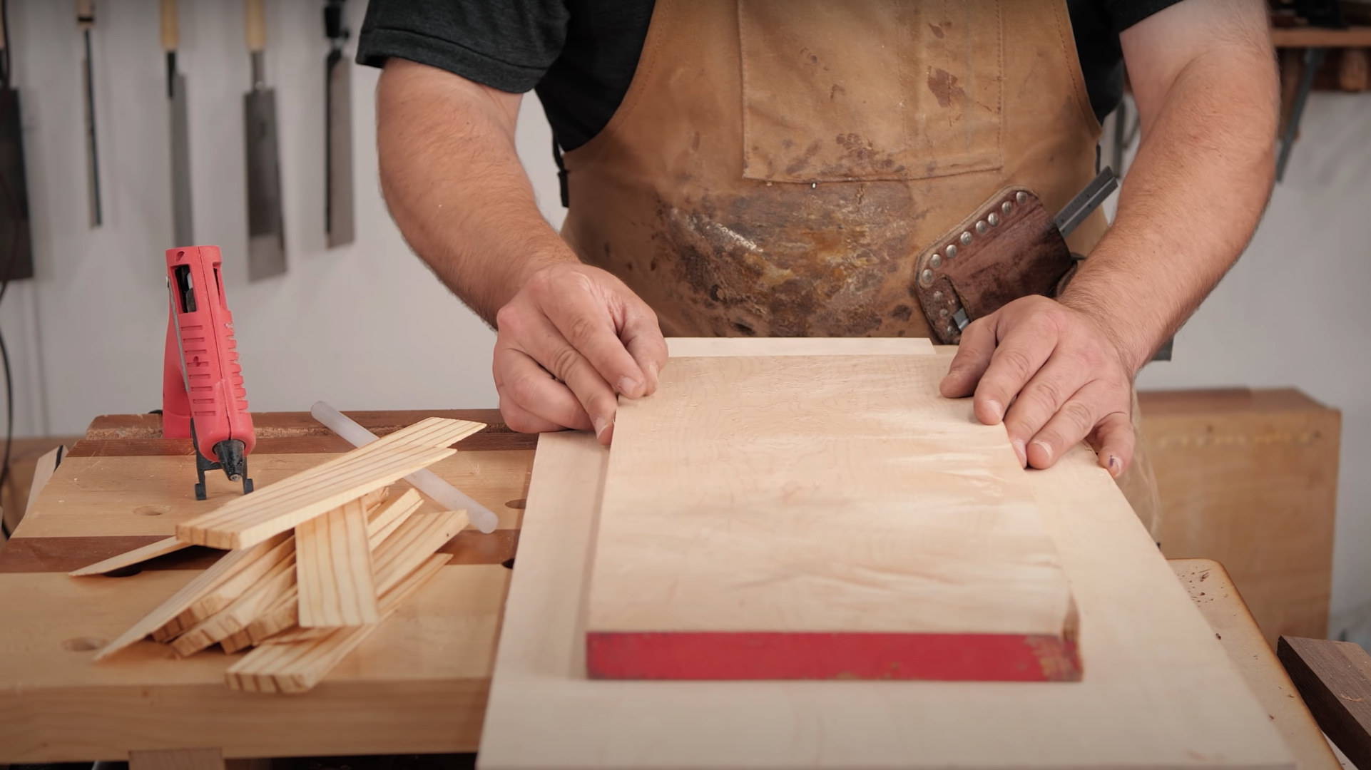 Placing a board on a planer jointing jig