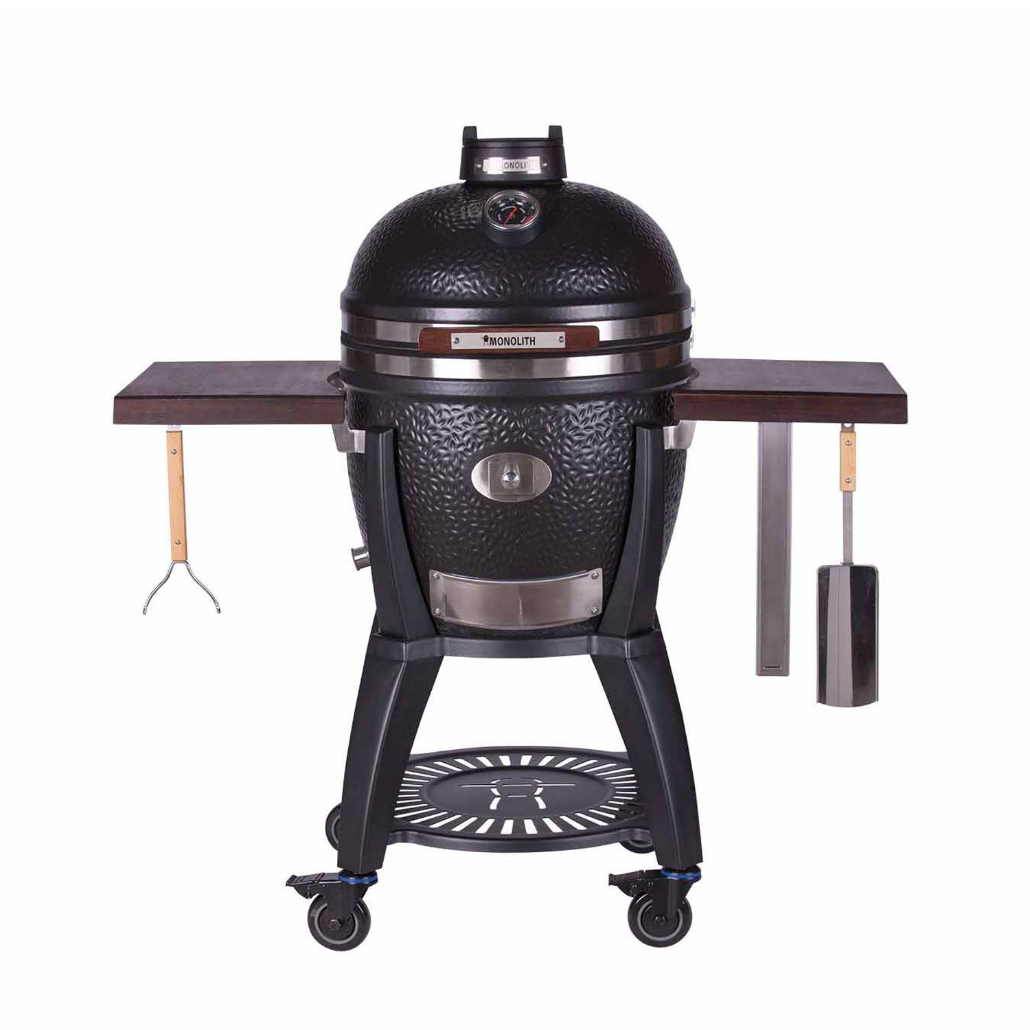 Black charcoal grill with wooden side tables and utensils.