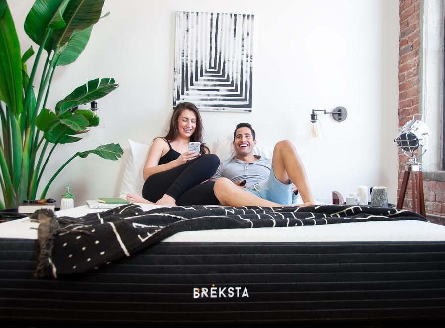 Millenial couple on non toxic breksta mattress