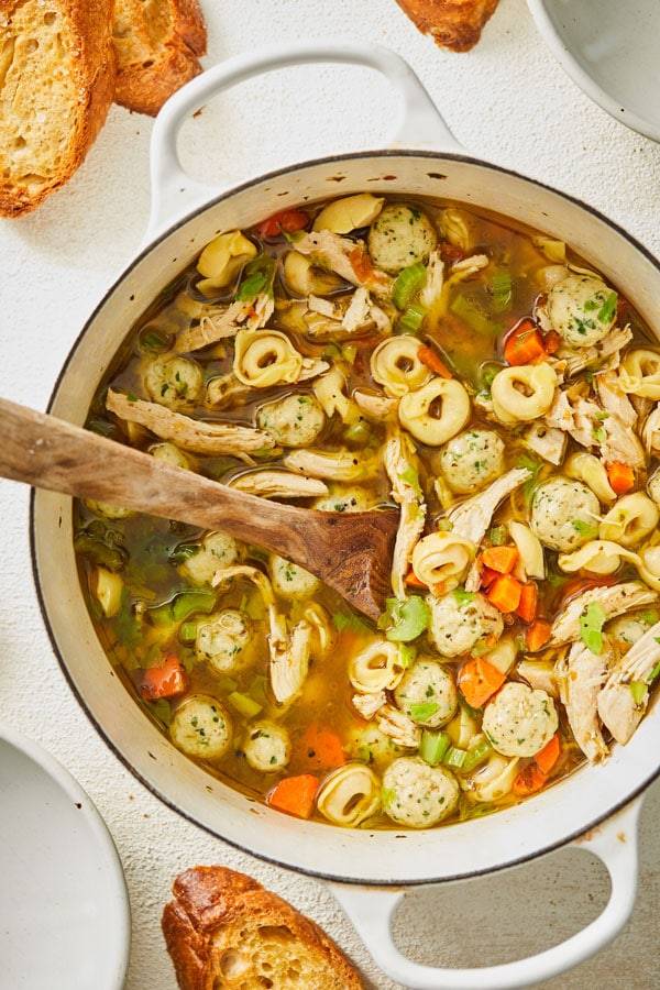 Chicken soup with cheese filled tortellini, mini chicken meatballs, and rotisserie chicken.