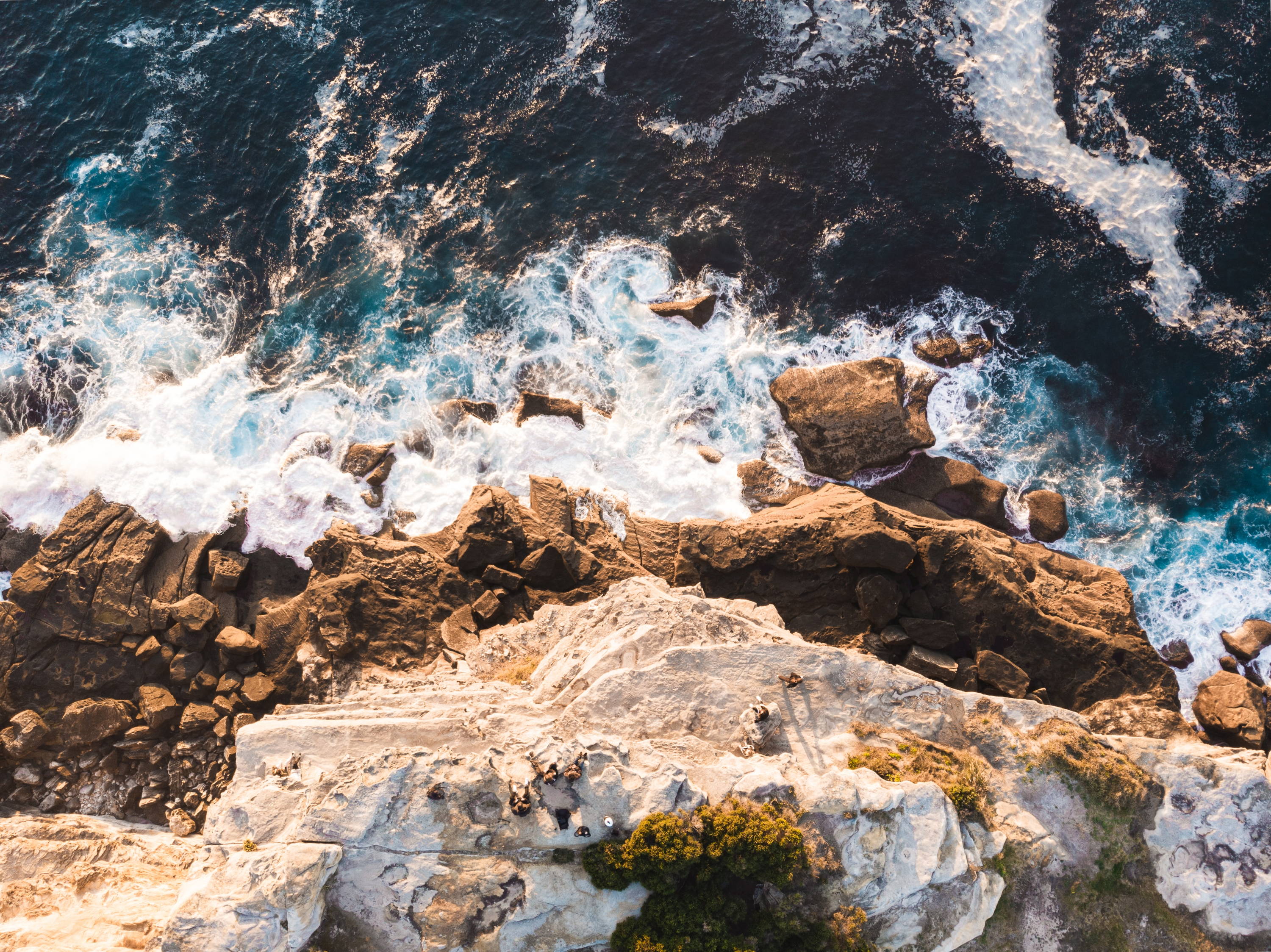 Overhead shot of rocky cliffs overlooking the ocean