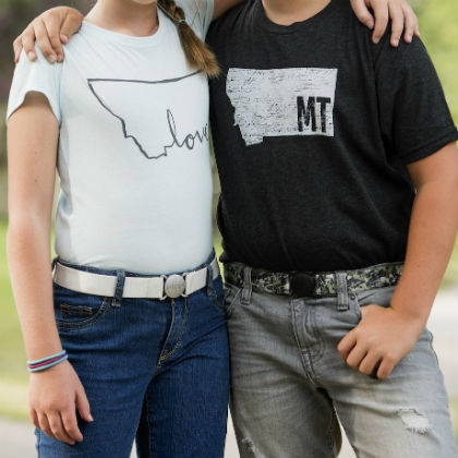 A girl and a boy ages 12, both wearing Jelt Youth belts with t-shirts and jeans 