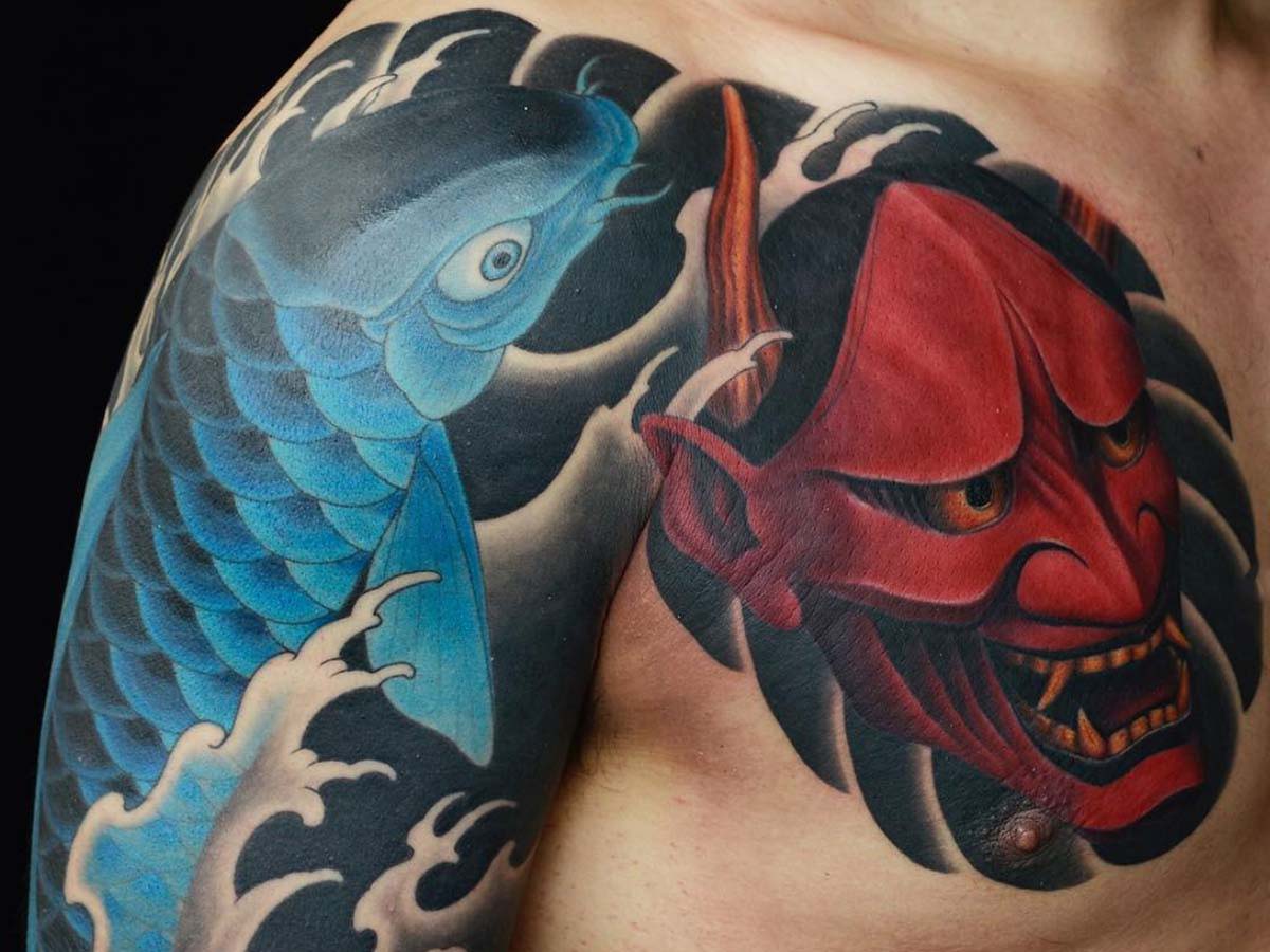 Blue Coy Fish and Red Devil | Expensive Tattoo Cost