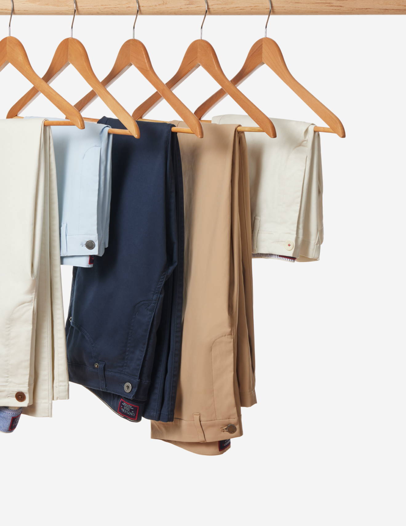 Collection of UNTUCKit pants and shorts.