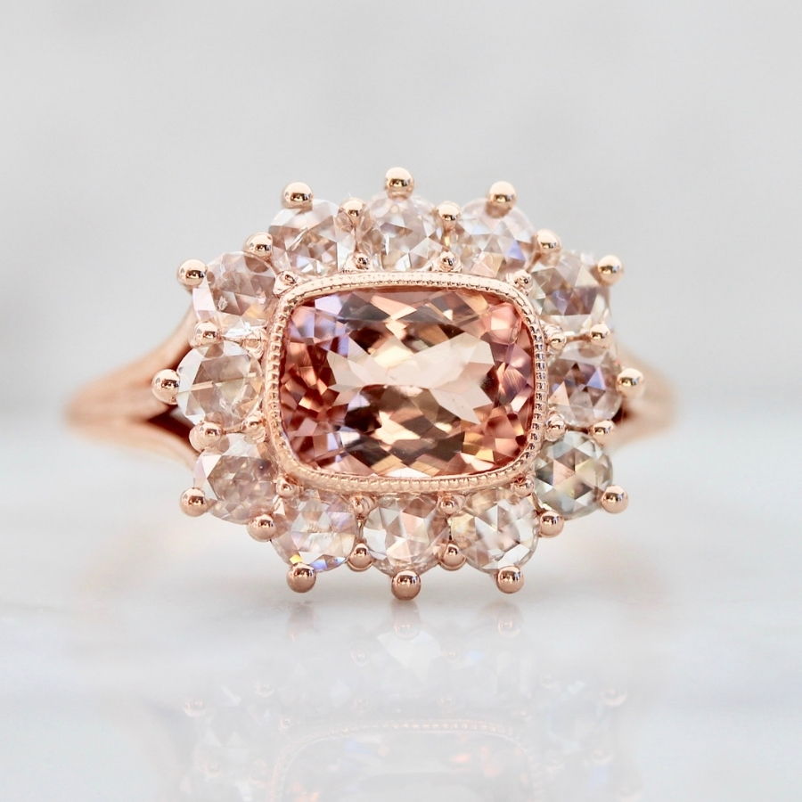 Pink cushion cut tourmaline ring with rose cut diamond halo
