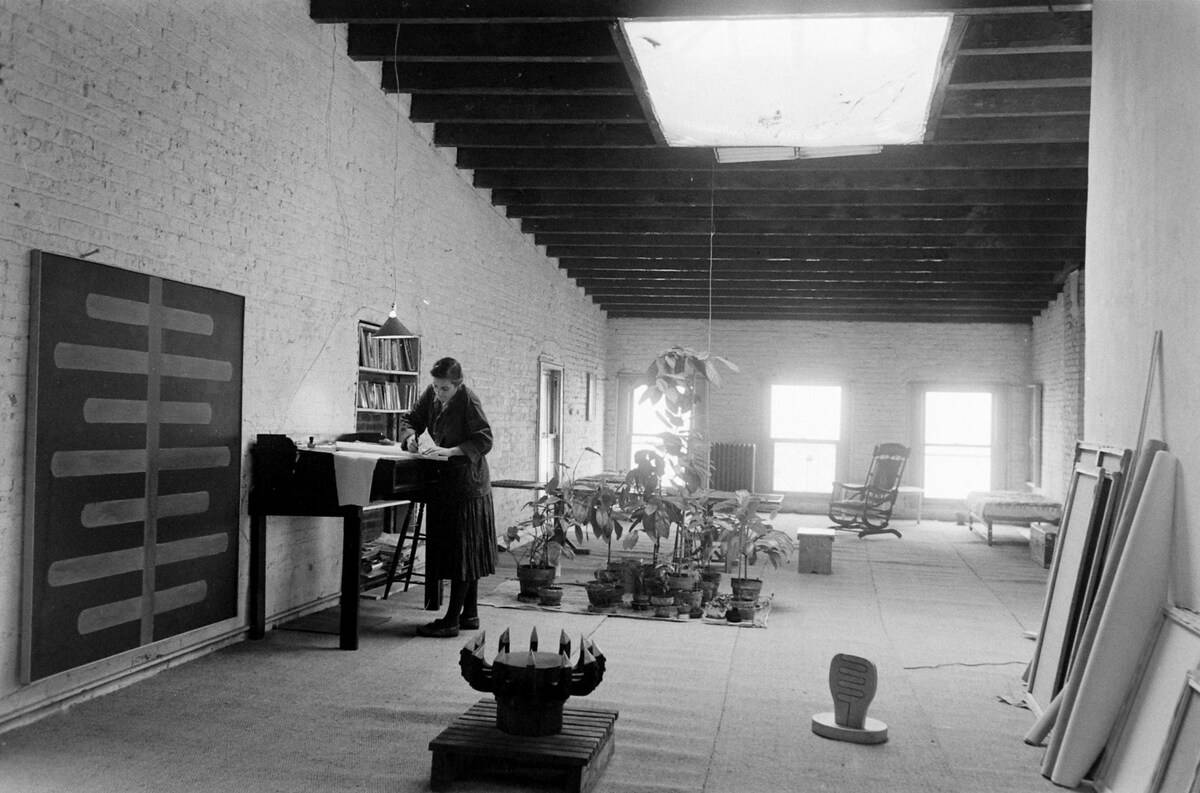 Agnes Martin working in her studio in New York in May 1961. Photography by Fritz Goro