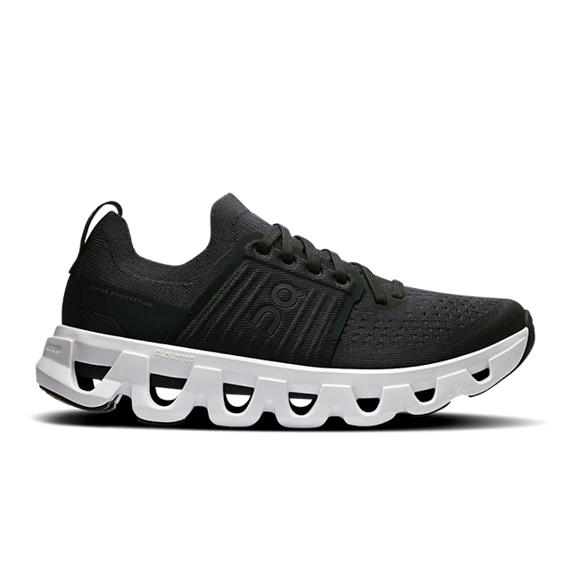 Black athletic shoe with a white sole and laces.