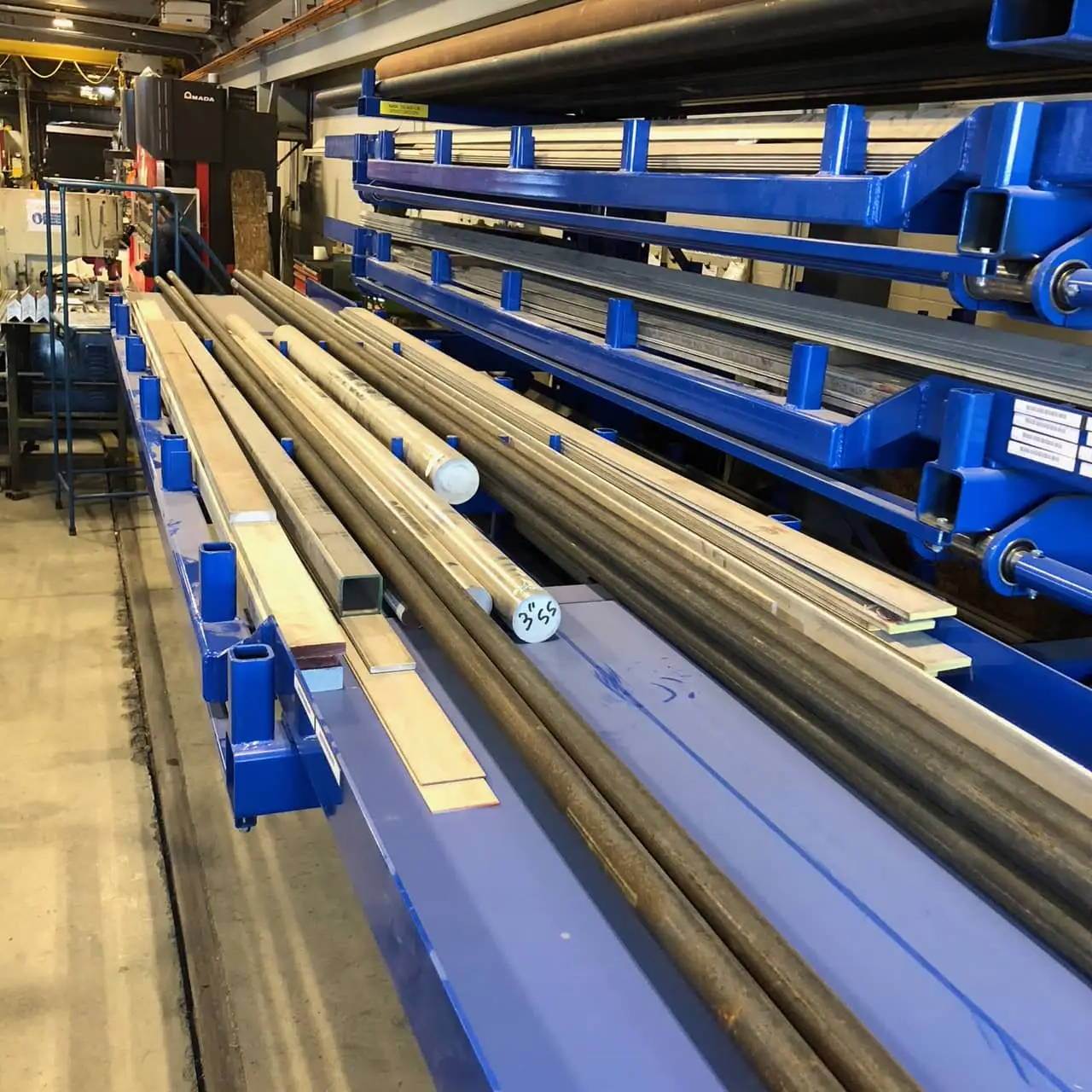 Storage area with metal bars and blue support structures.
