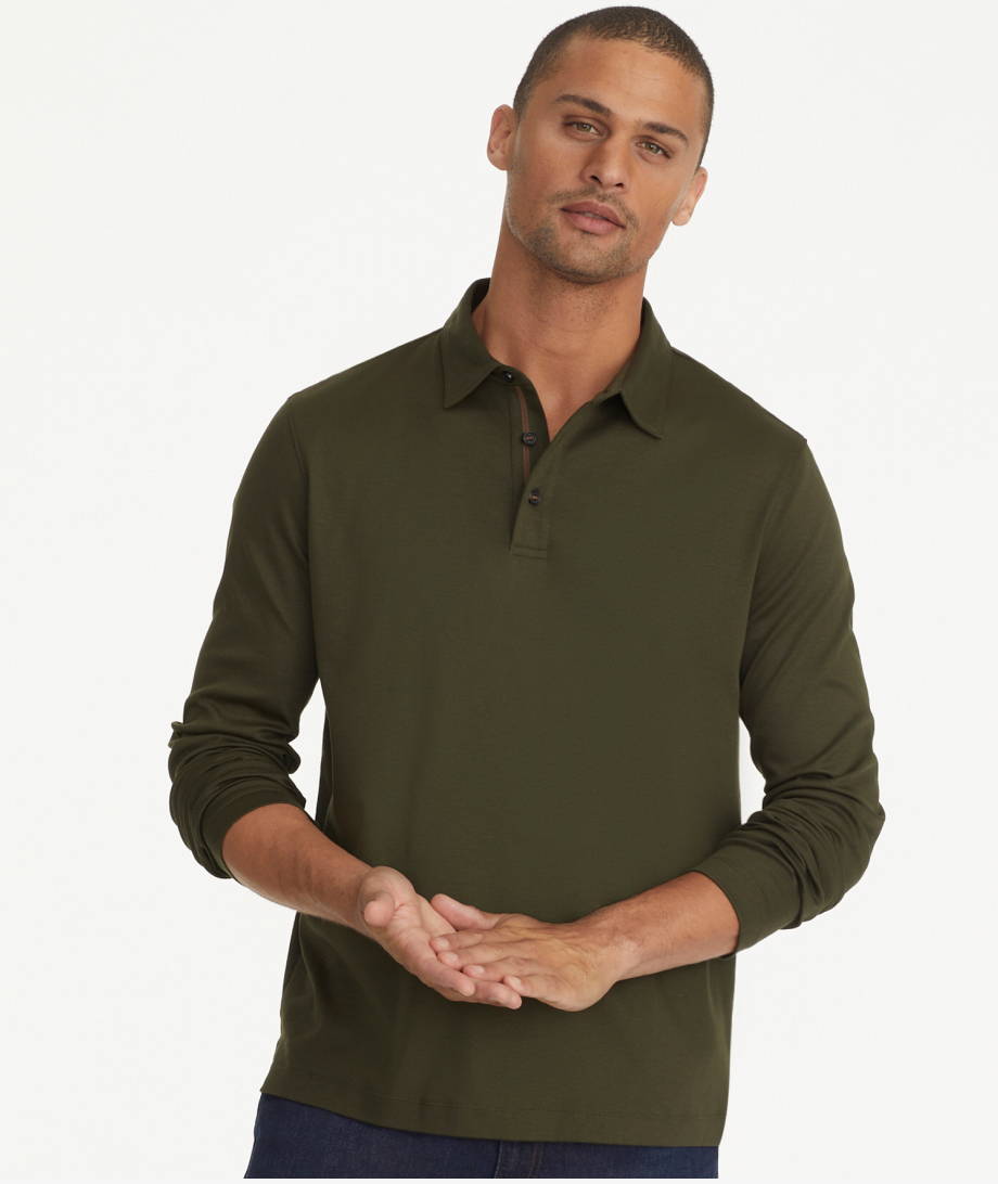 Model is wearing UNTUCKit green long sleeve polo. 