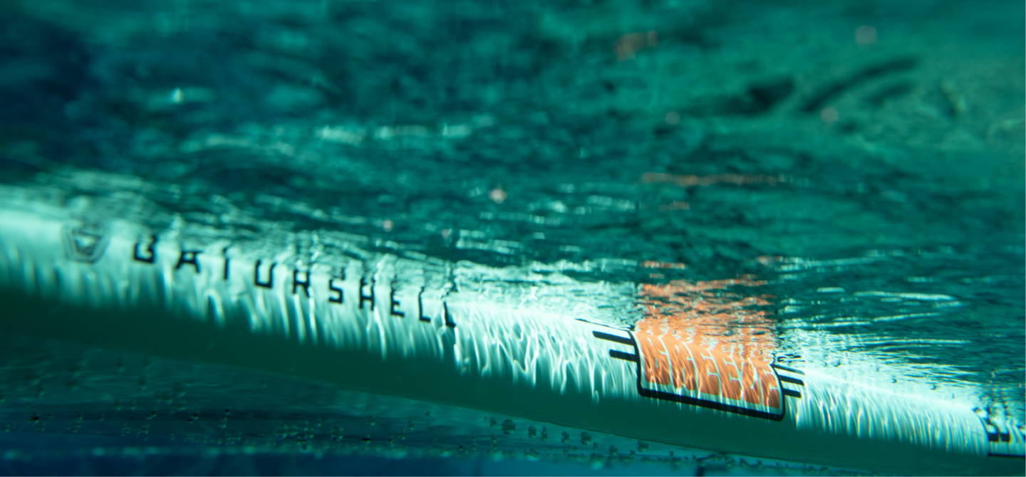 Underwater view of a Breeze Gatorshell Paddle Board