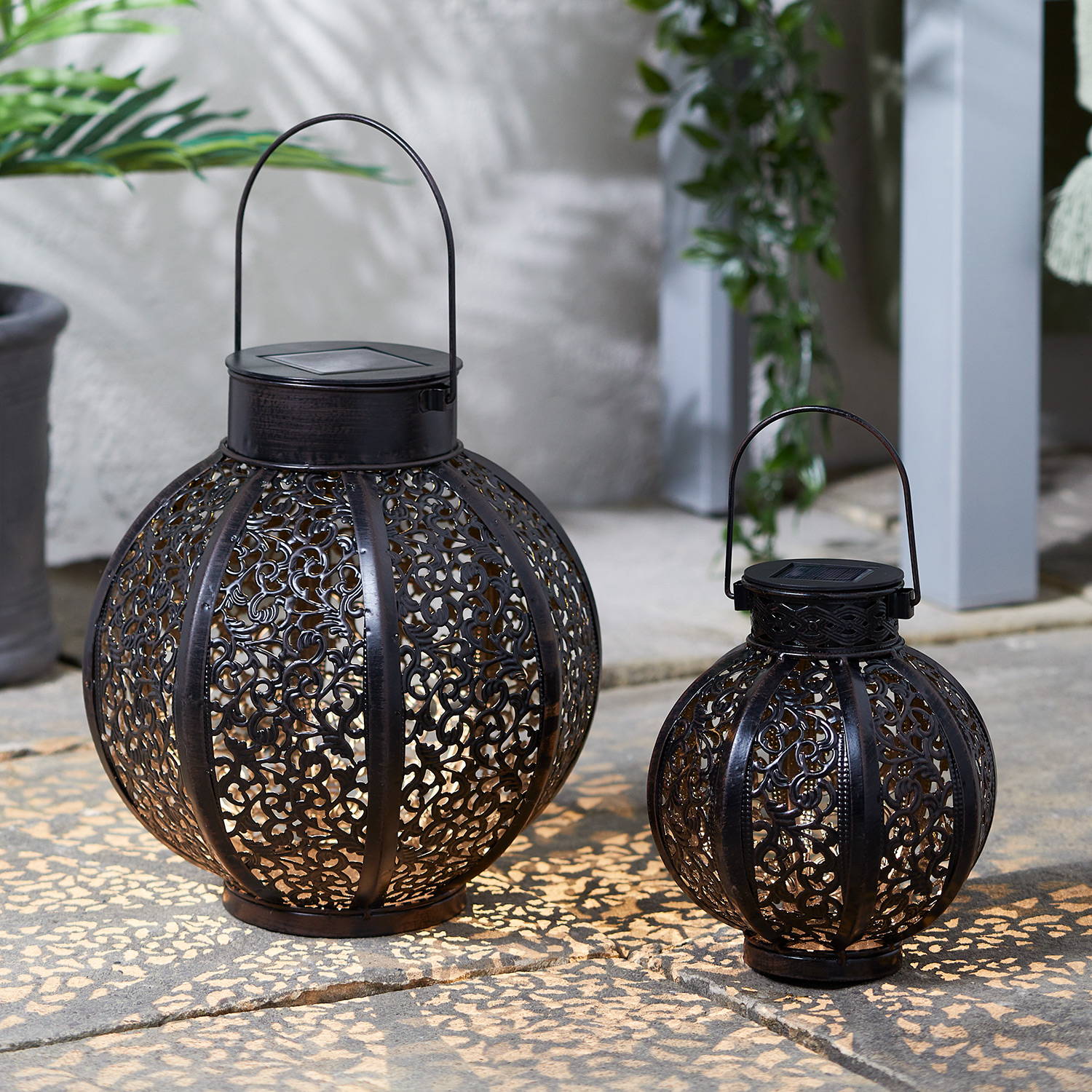 Casablanca solar lantern duo illuminated on patio