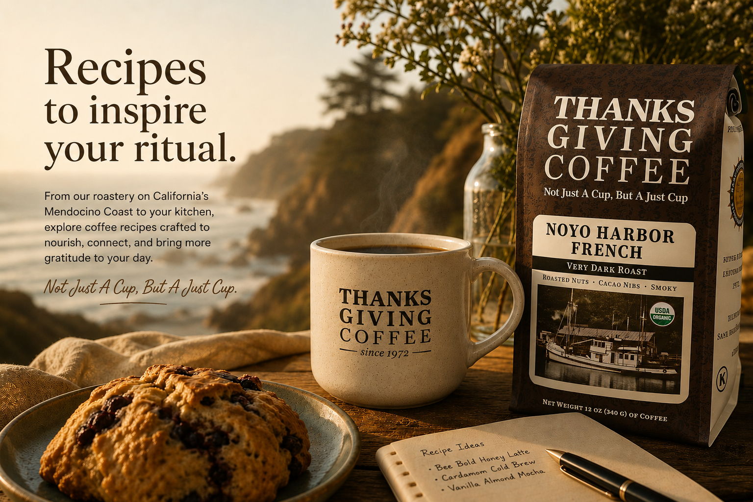 Coffee cup, baked goods, and coffee bag by the ocean.