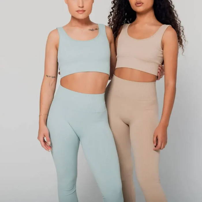 female models wearing matching teal and tan sacre ribbed sets