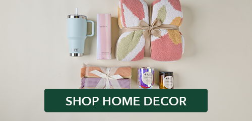 Home decor items including towels, a mug, and decorative accessories.