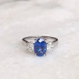 diamond and sapphire three stone engagement ring