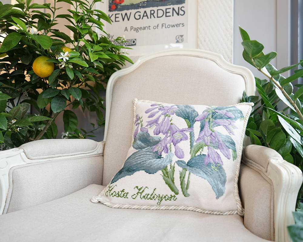 Close up of Hosta Halcyon pillow on cream chair