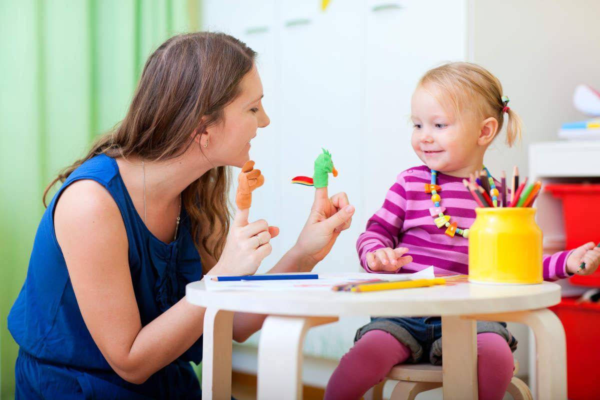 Young mother and her toddler girl playing together with finger toys | How The Lack of Protein Affects Your Brain and Overall Health