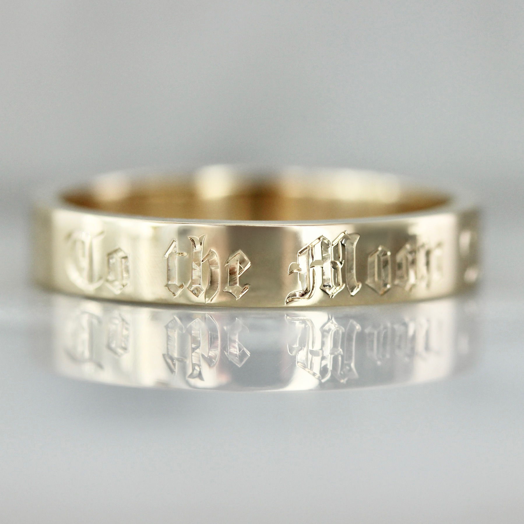 Hand-engraved ring to the moon and back
