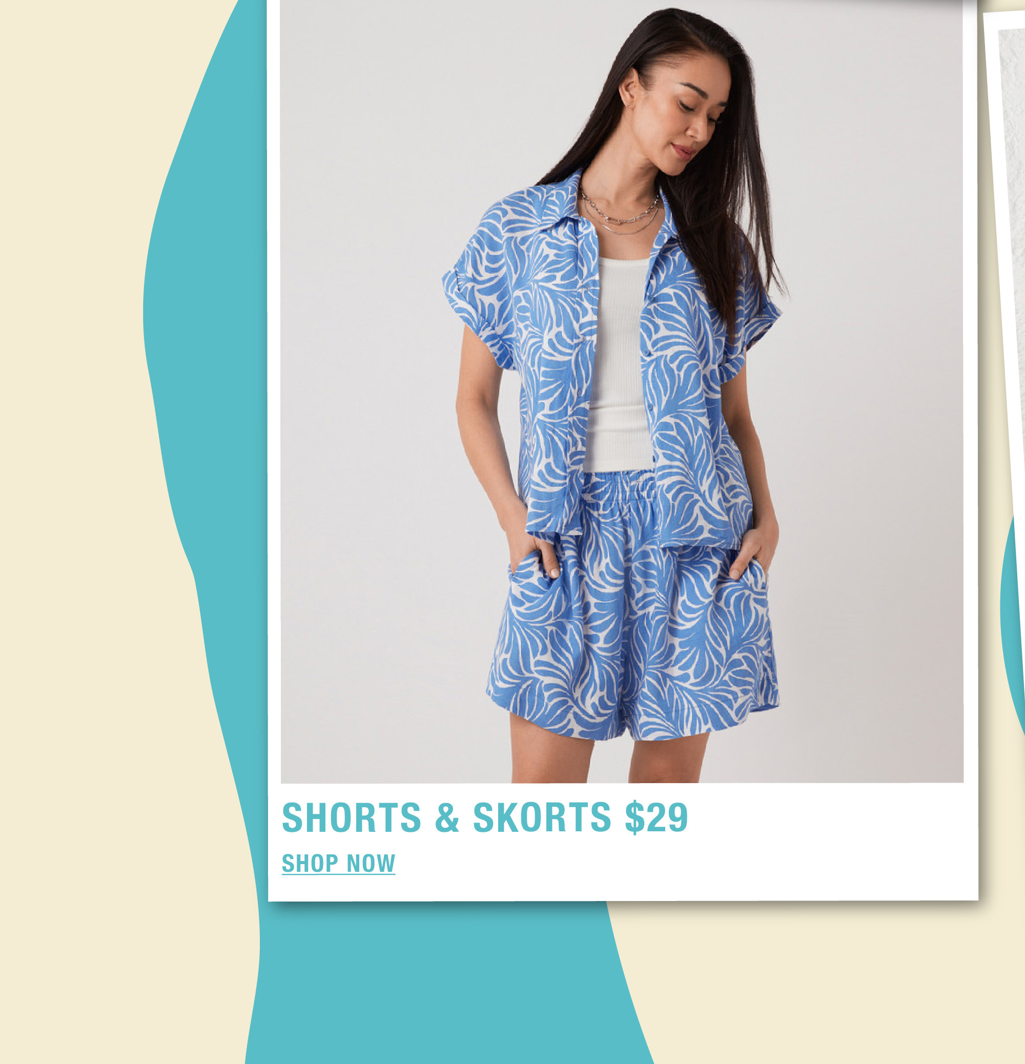 Model wearing a blue patterned shirt and shorts outfit, priced at $29.
