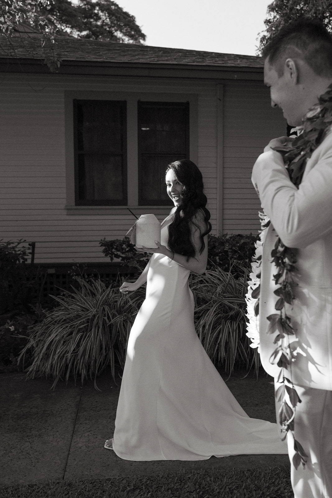 Bride holding hawaiian coconut