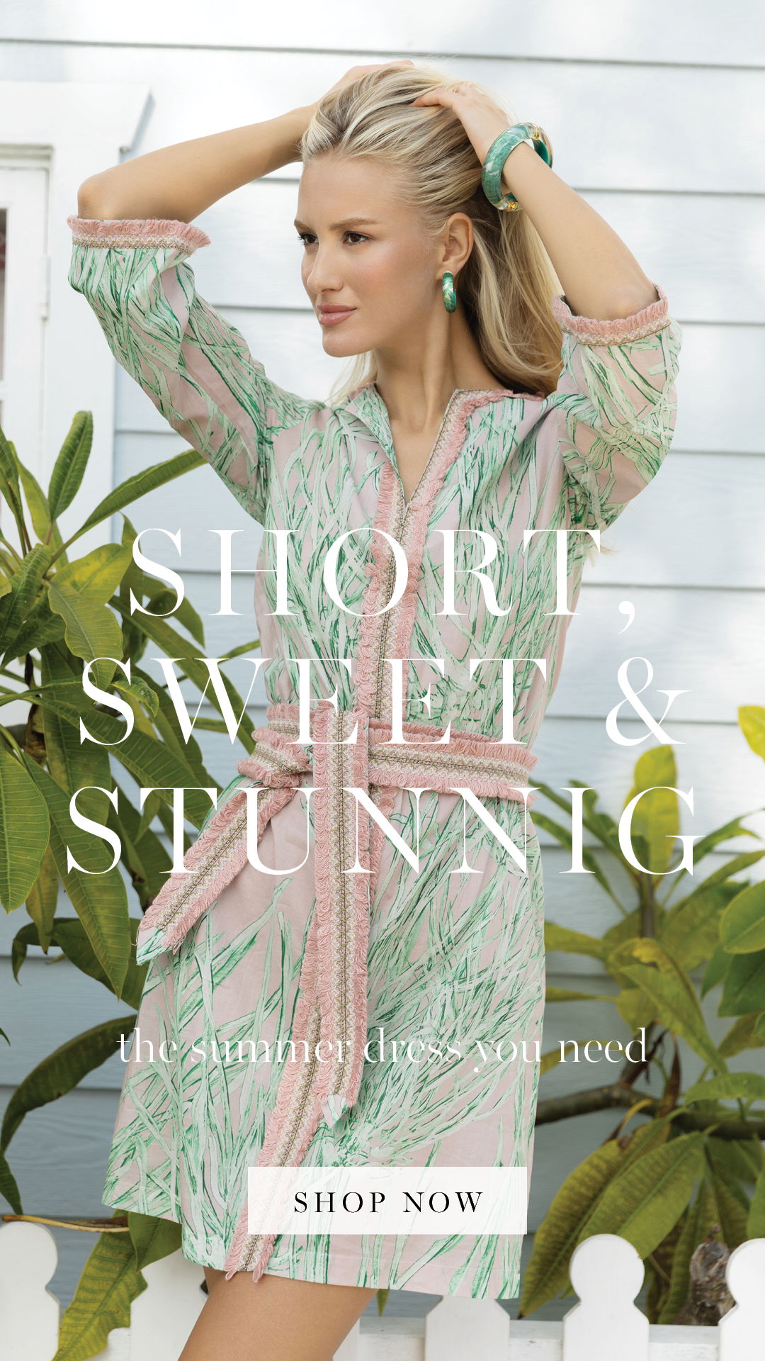 Model in a stylish dress promoting summer fashion.