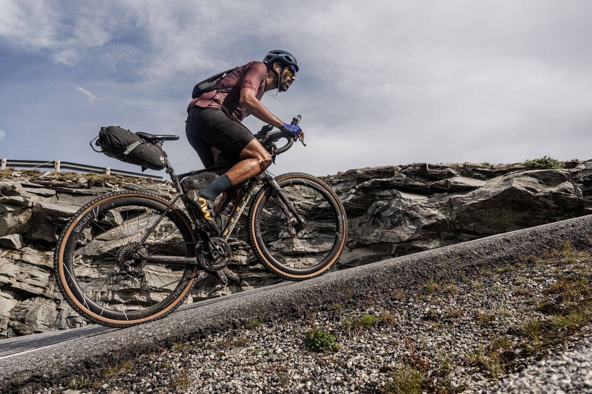 Sofiane riding up a climb