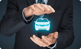 A person in a suit holding a holographic car between their hands.