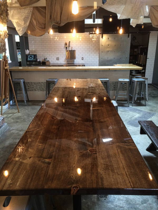 A dark wooden epoxy table top