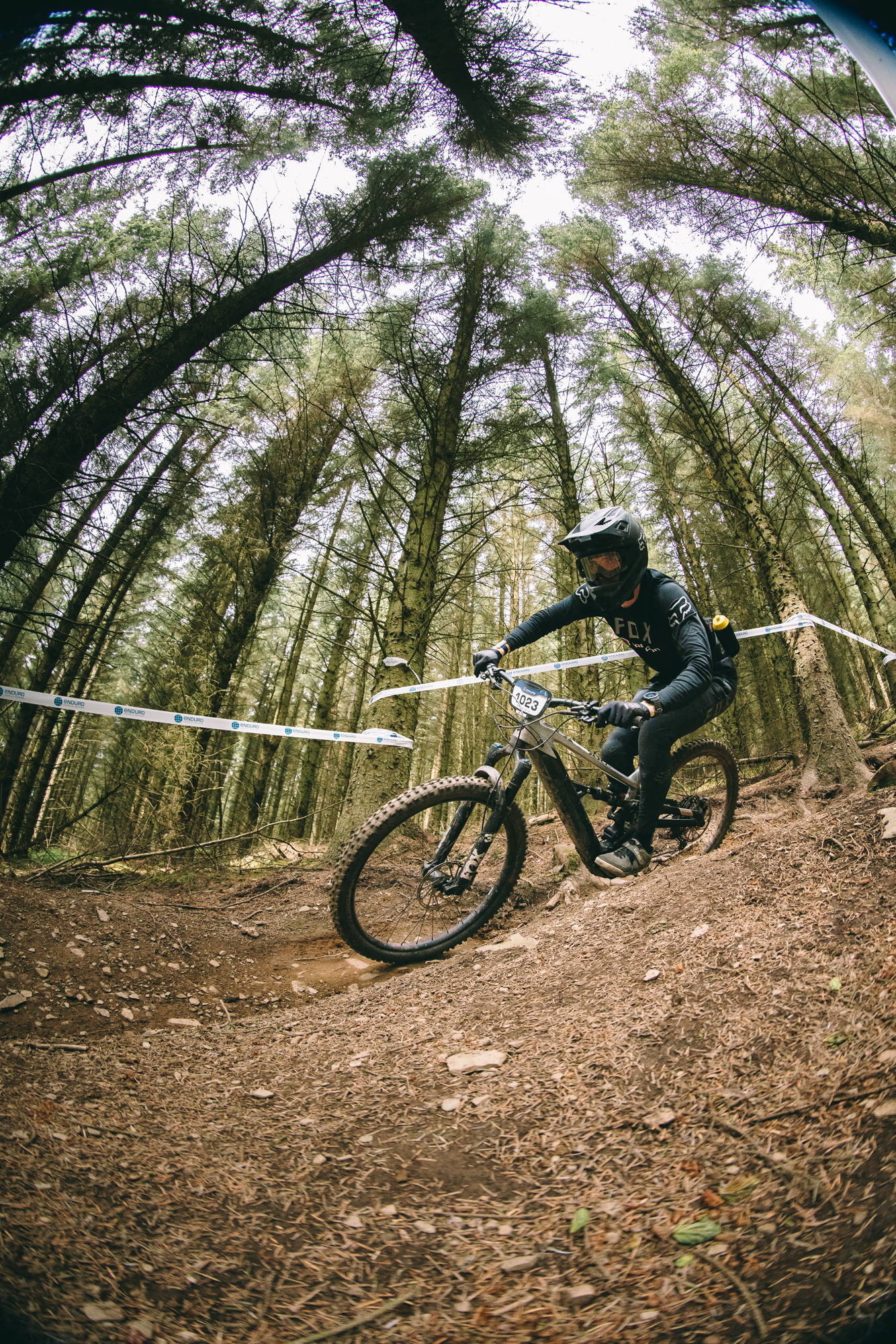 Mountain biker navigating a berm